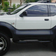 Image for article titled For $13,500, This 1999 Isuzu VehiCROSS Could Let You Pretend You're Robert Downey Jr… Or Ozzy Osbourne